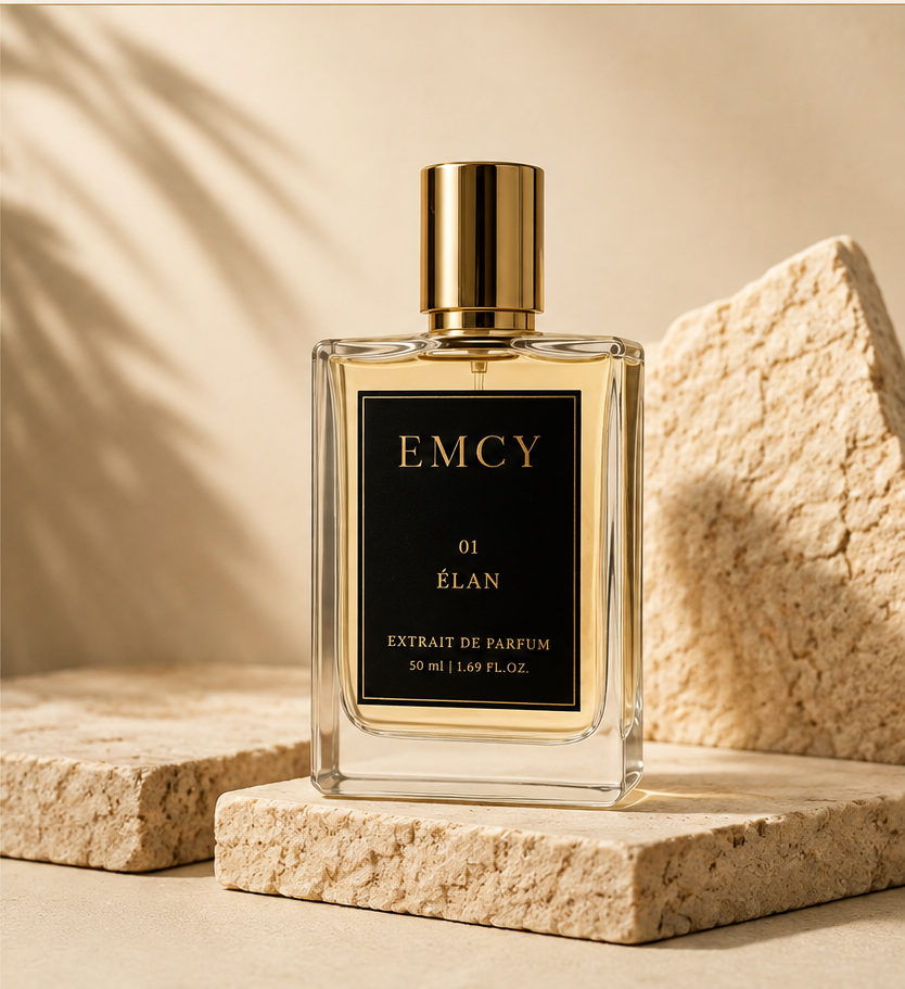 EMCY 01 — ÉLAN 50ml fragrance bottle on warm ivory stone